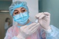 Medical worker is preparing a Russian-made vaccine Sputnik V for vaccination against coronavirus infection COVID-19